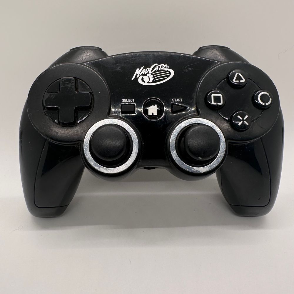 MadCatz Game Controller‎ Wireless Pad Battery PoweredBlack Dual Analog Sticks
